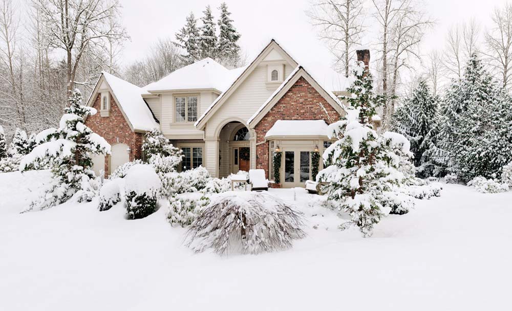 a house covered in snow